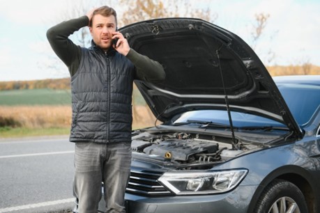 A man calls for help with his non-running car